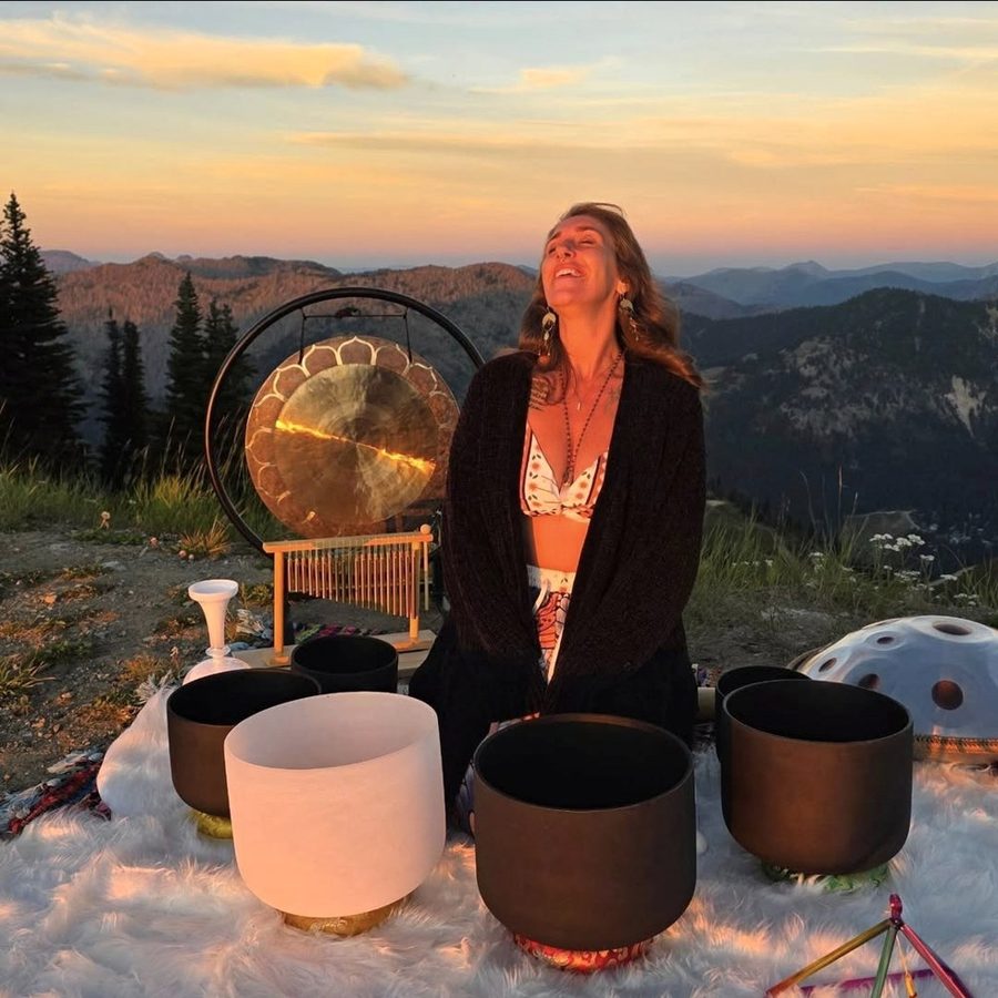 Melanie leading a sound bath at sunset